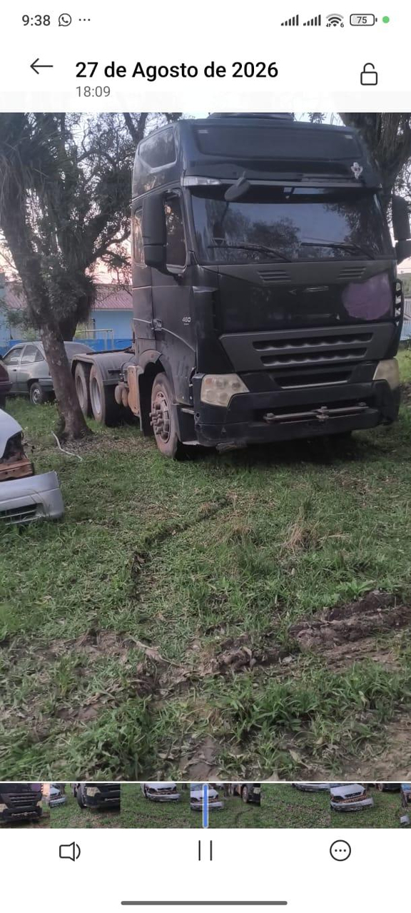 sinotruck a7 6x4 sendo baixado no detran